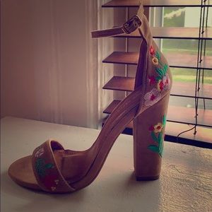 Tan color high heels.